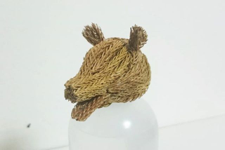 Illustration for article titled Godzilla Made from Pine Tree Branches Is a Lovely Fire Hazard
